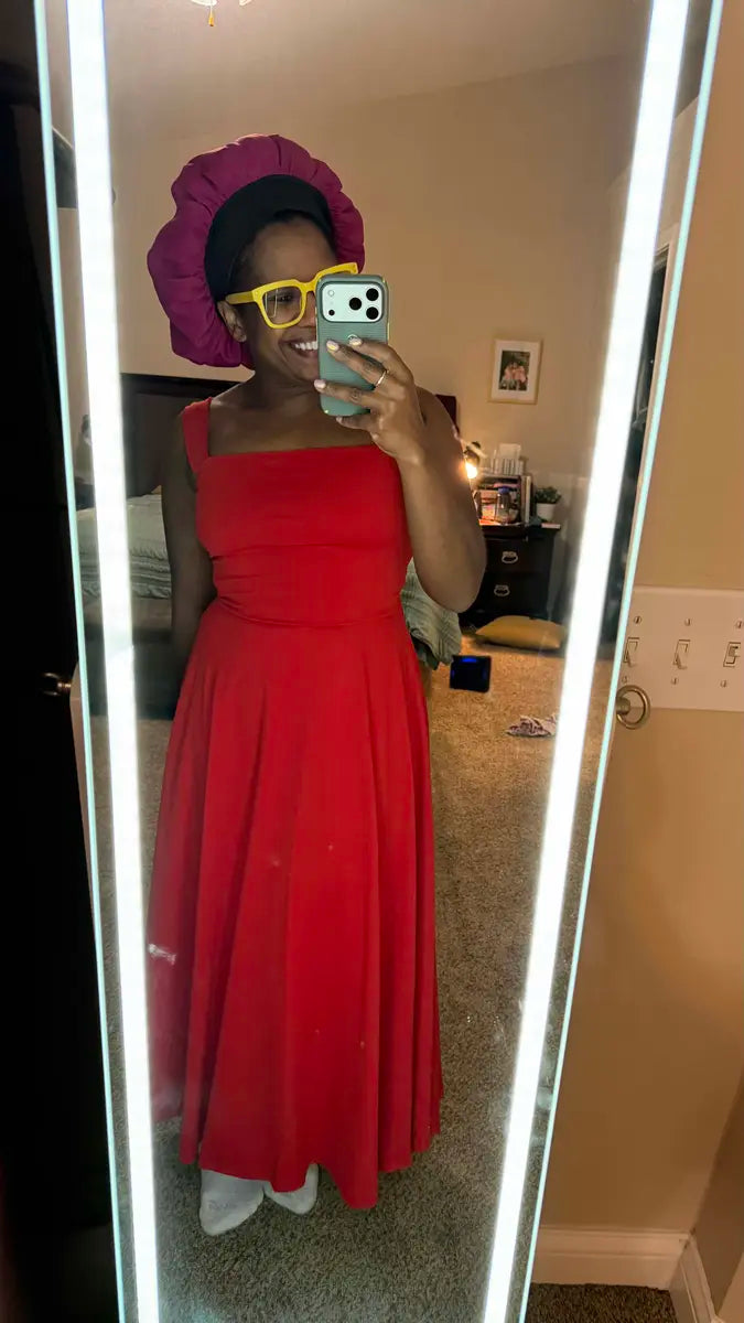 Customer wearing the red dress